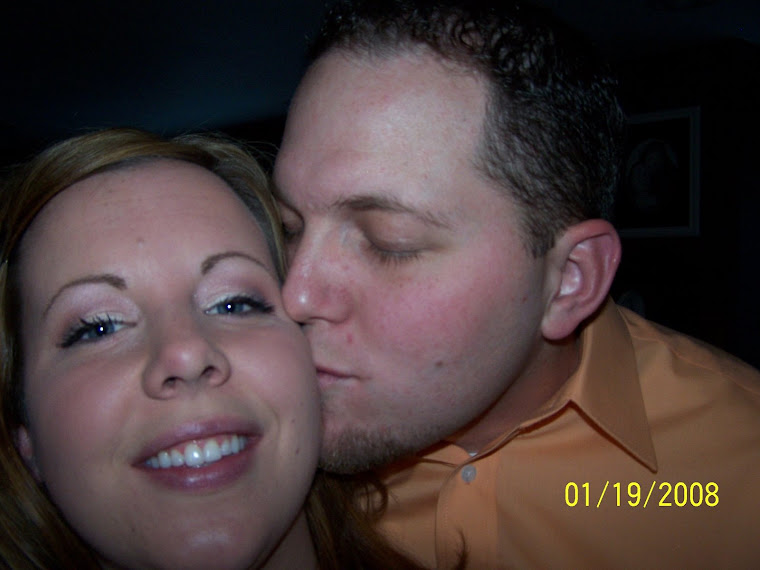 Bryon and Tiffini sittin' in a tree....