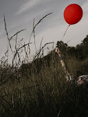 & here it is, a red balloon,