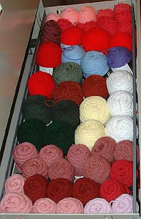 yarn stored in a lateral file cabinet