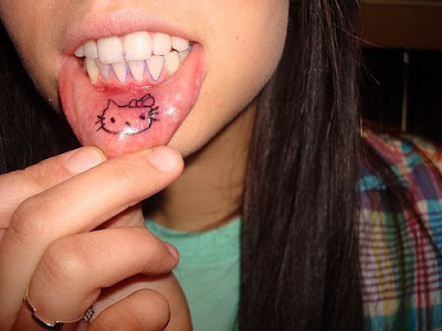 hello kitty tattoo on lips