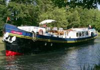 Cruise the French canals aboard French Hotel Barge ANJODI - contact ParadiseConnections.com