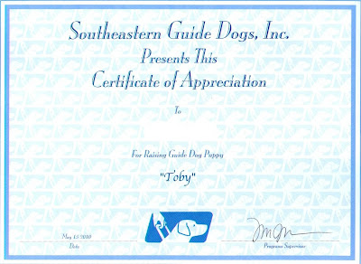 Certificate says: Southeastern Guide Dogs, Inc. Presents This Certificate Of Appreciation. To: (me).  For Raising Guide Dog Puppy: Toby