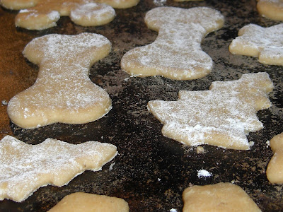 Up close picture of the dog treats (dog bone/Christmas tree shaped) before their cooked