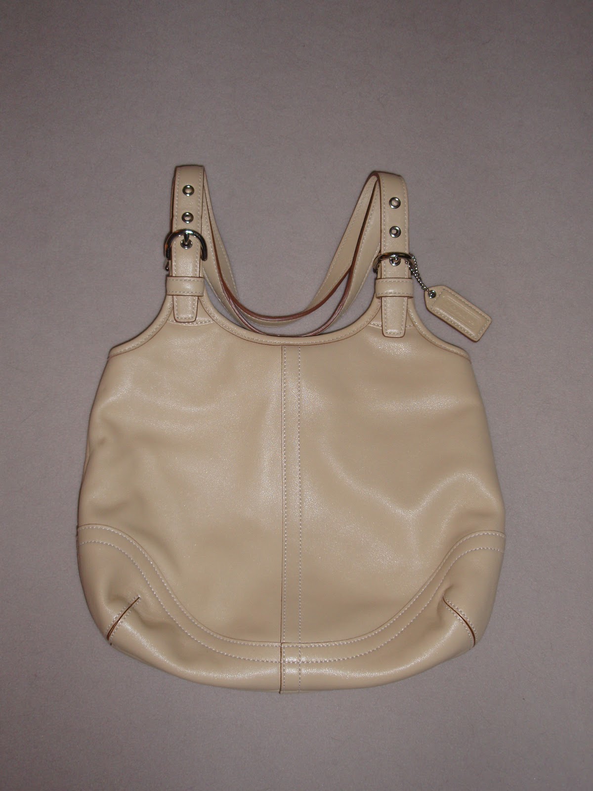 tan leather coach