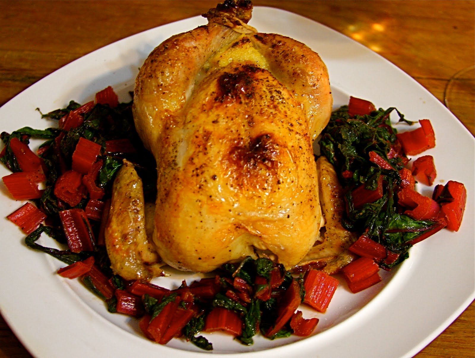 Dine Well Sage Polenta Stuffed Roasted Cornish Game Hens with Greens