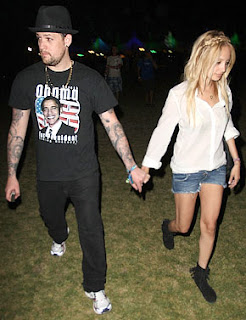 Joel Madden sports a Barack Obama tee shirt as he holds hands with fellow Obama supporter, Nicole Richie