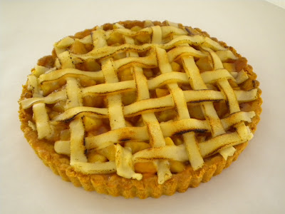 Apple almond tart--almond crust topped with glazed apples and a marzipan lattice