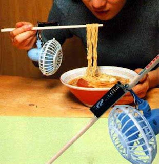 crazy photos funny inventions cool your noodles with a fan attached to chopsticks pic