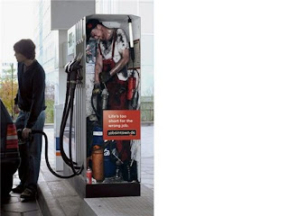 funny gas station photo man inside pumping gas