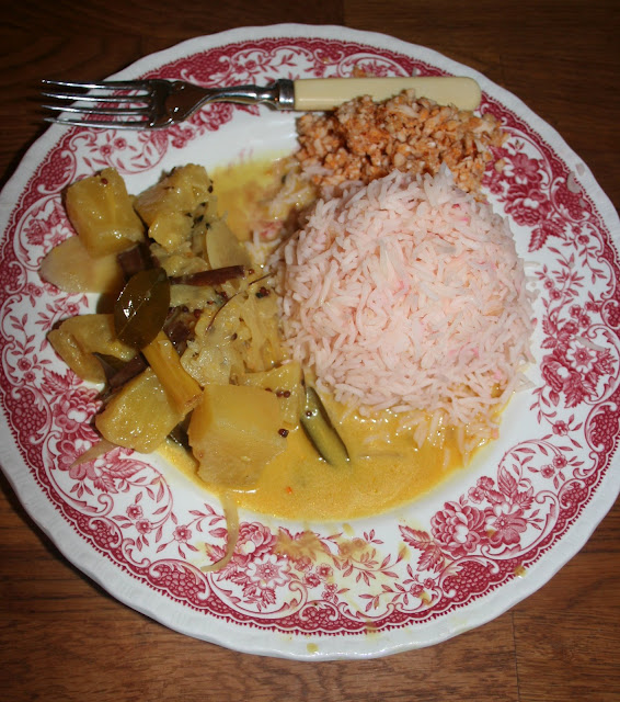 Pineapple and coconut curry with basmati saffron rice and fresh coconut sambal.