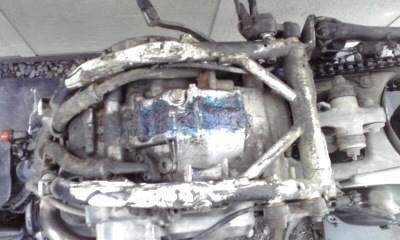 father and son: temporary quick oil leak fix