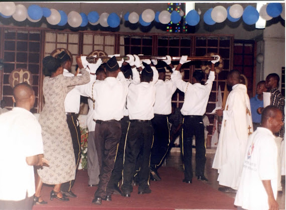 Cross being carried to Altar