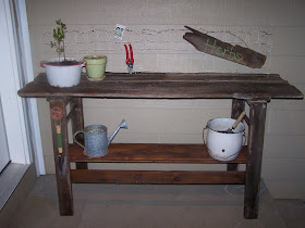 barn door potting bench http://bec4-beyondthepicketfence.blogspot.com/2008/05/project-number-four-made-from-and-old.html
