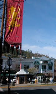 Photo of Ashland, Oregon's downtown plaza, with the Oregon Shakespeare banner in the upper left of the image.