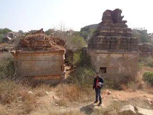 Arun performing a fun dance pose in front of the ruins of Penukonda Fort