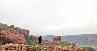 Madhu enjoying the sunrise over the ancient structures, reflecting on the trip