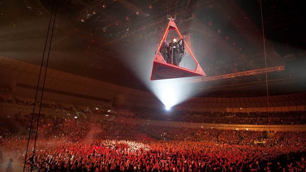 BABYMETAL flying through the air in a gondola during THE ONE at Yokohama Arena