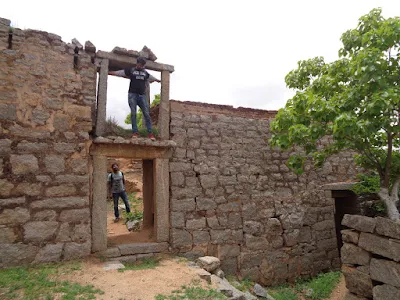 Hikers goofing around the old ancient structures