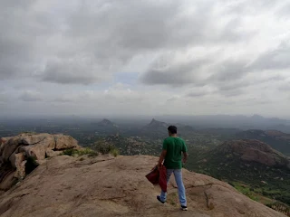 Hiker walks atop the Rayakottai fort admiring the 360 degree view of this ancient military base
