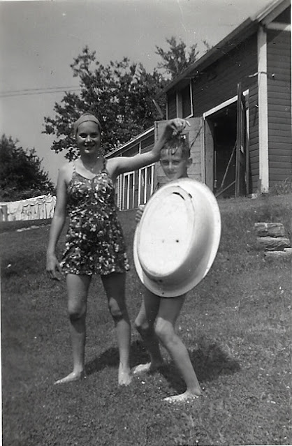 Frances Ann Cates and Richard Putnam with tub at 24 Center Street, Leeds, MA, abt 1937