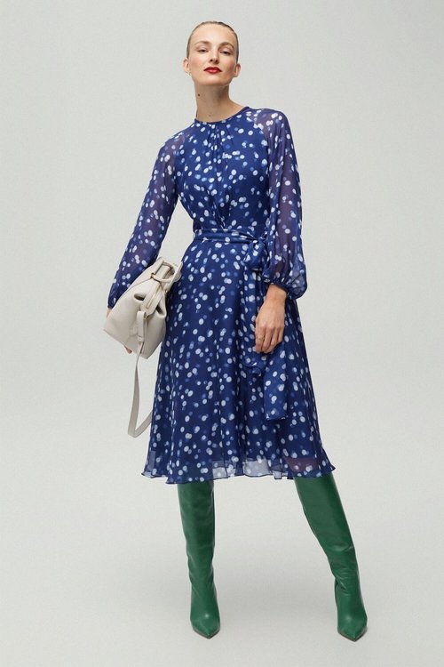 For the National Day celebrations, Sofia was wearing a blue polka dot dress from Carolina Herrera.