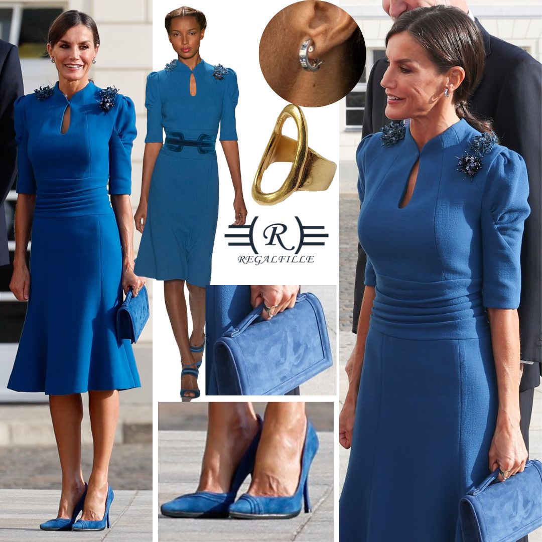 Queen Letizia wore a cornflower blue Carolina Herrera dress with Bulgari hoops, a Karen Hallam ring and Magrit shoes and a Bag for the welcome ceremony in Germany