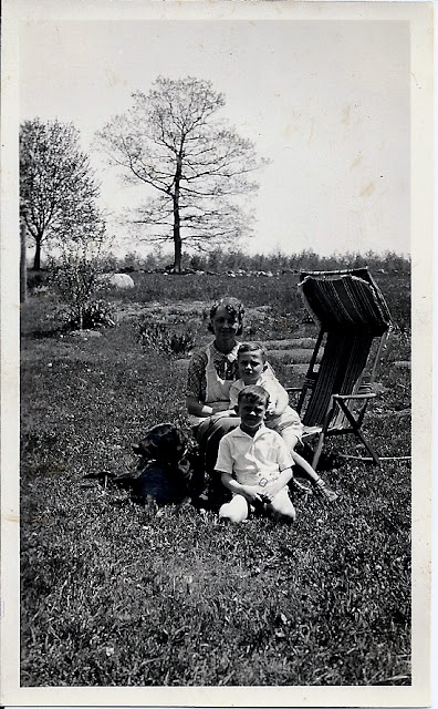 Mary, Robert and Richard Putnam with their black lab, abt 1933