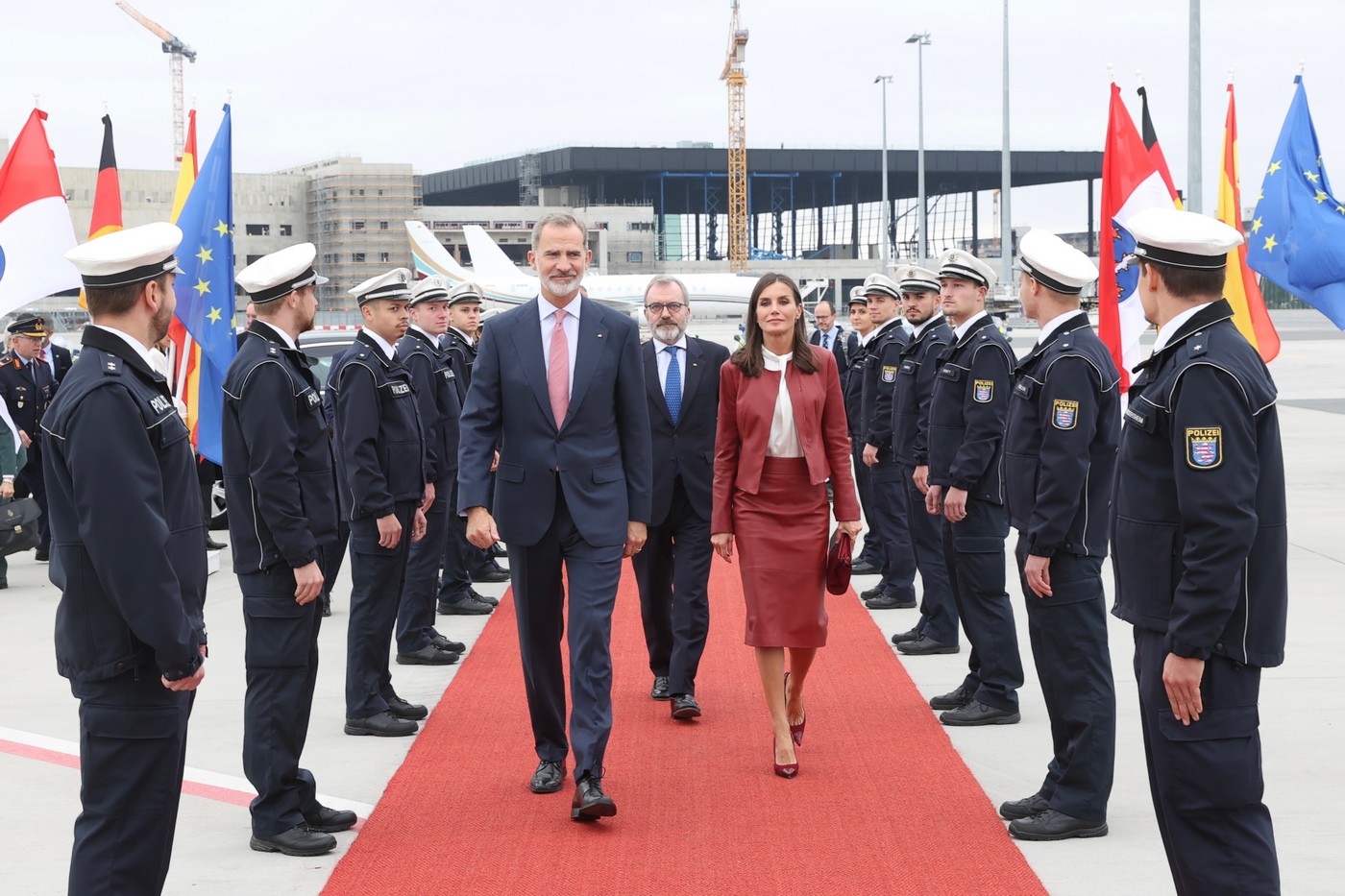 On the last day of the German state visit, Queen Letizia of Spain wore Hugo Boss Sabarbie Cropped Leather Jacket with Hugo Boss Selrita Pencil Skirt and Hugo Boss Banika blouse paired with a Magrit suede-leather trimmed pumps and Mara bag, Gold and Roses Needle earrings and Karen Hallam ring.