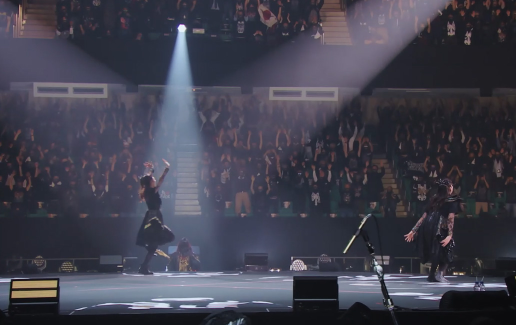 BABYMETAL encouraging the crowd to do the wave