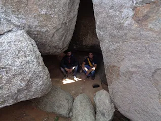 View of the ruined buildings and cisterns on the summit of Ratnagiri Fort