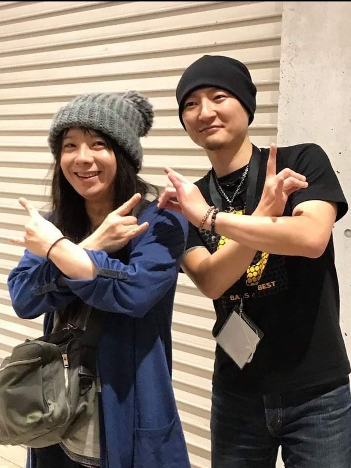Mikio and Boh doing the Fox Sign
