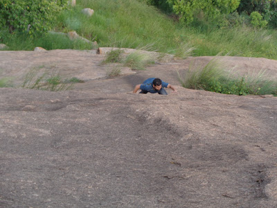 Avi navigating the toughest stretch on the steep rock face of Bhairavadurga
