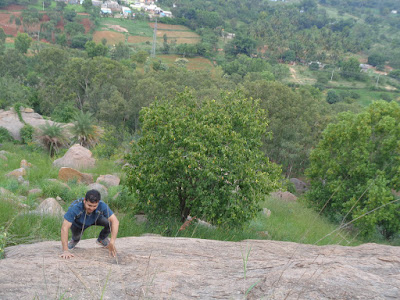 The hiker free styling on the steepest rock face of bhairavadurga
