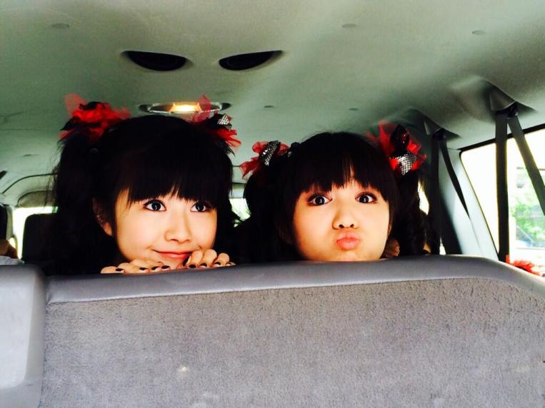 YUIMETAL and MOAMETAL in the backseat of a van